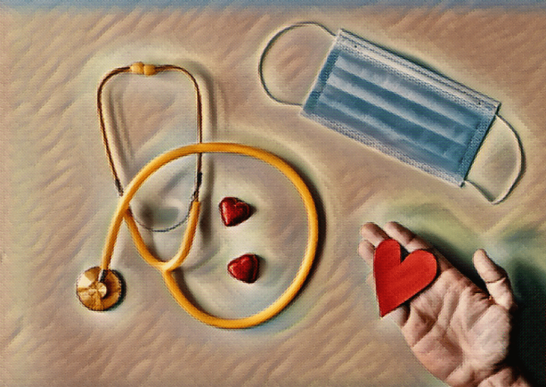 hand holding heart with stethoscope and mask