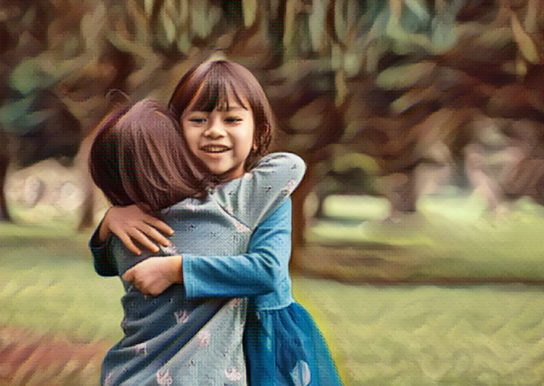 two young kids hugging