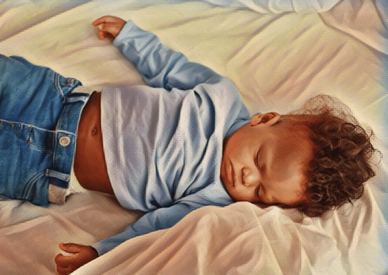 toddler infant taking a nap on bed