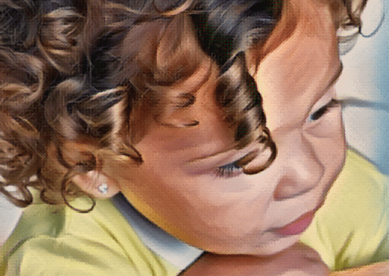 young girl toddler with brown curly hair